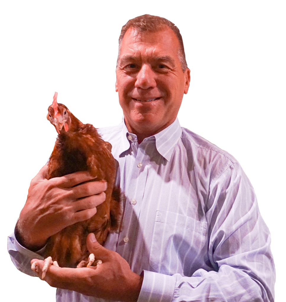 man holding chicken