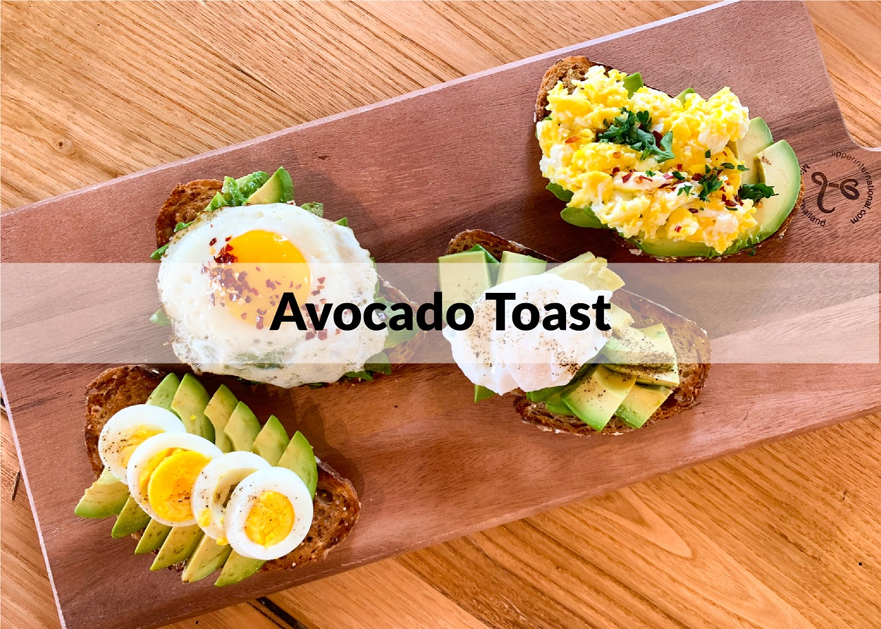 avocado toast 4-ways on a butcher board